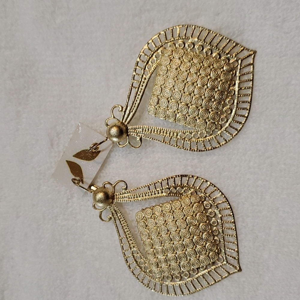 Beautiful gold tone Greek Designer earnings